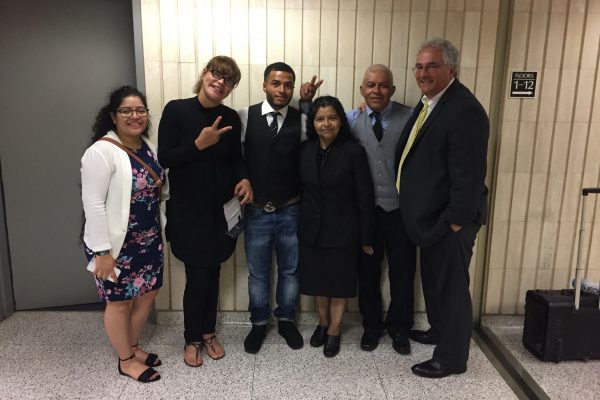 George Terezakis with clients after case