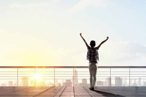 happy person on a sky scraper