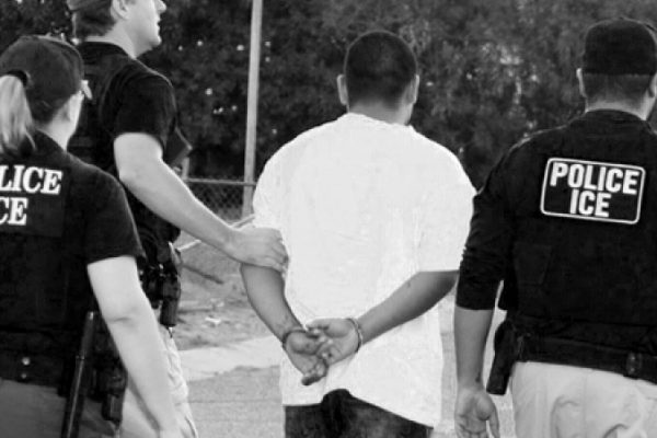 person being escorted by police